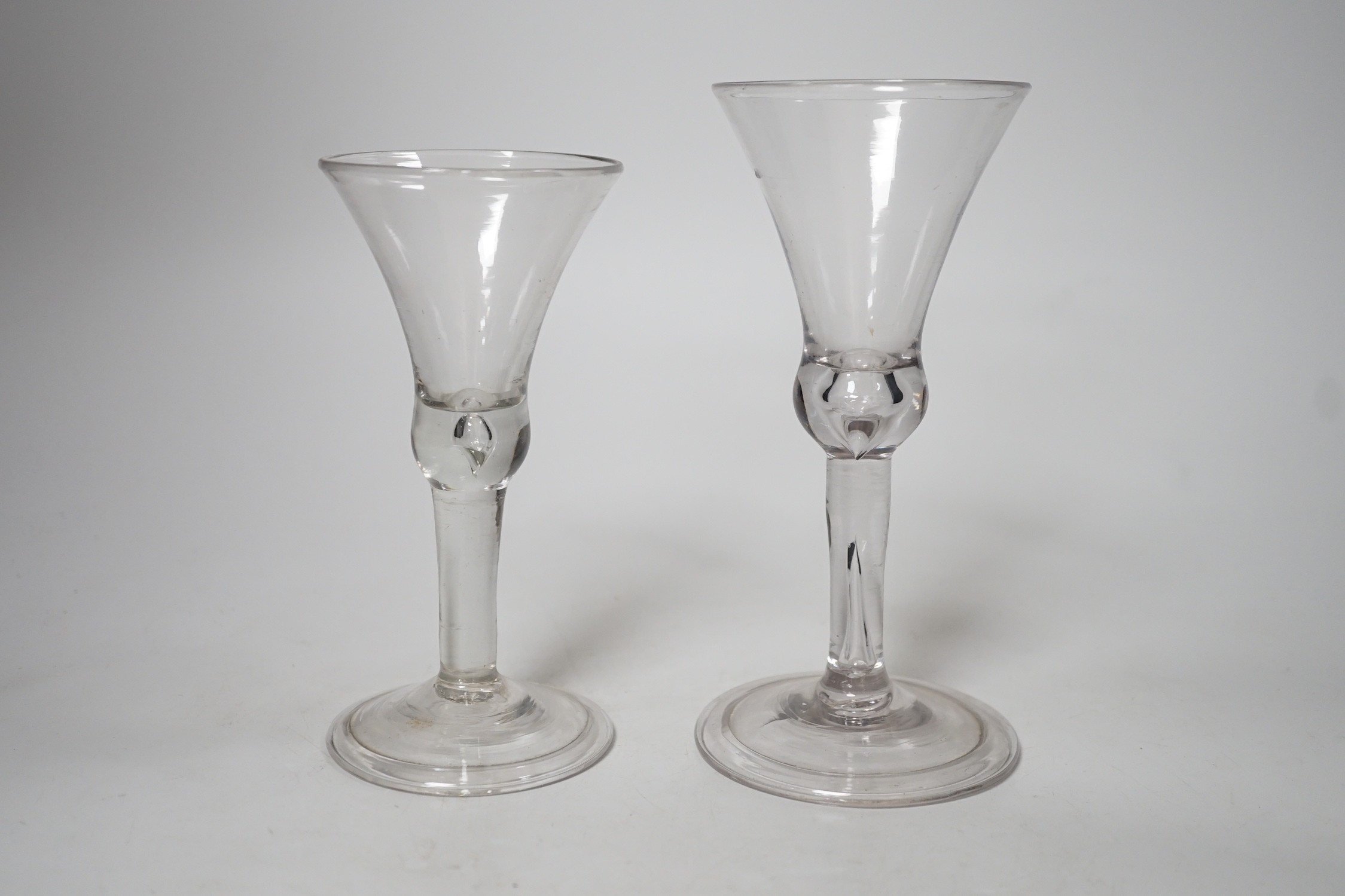 Two Georgian style glass ale flutes. Tallest 18cm